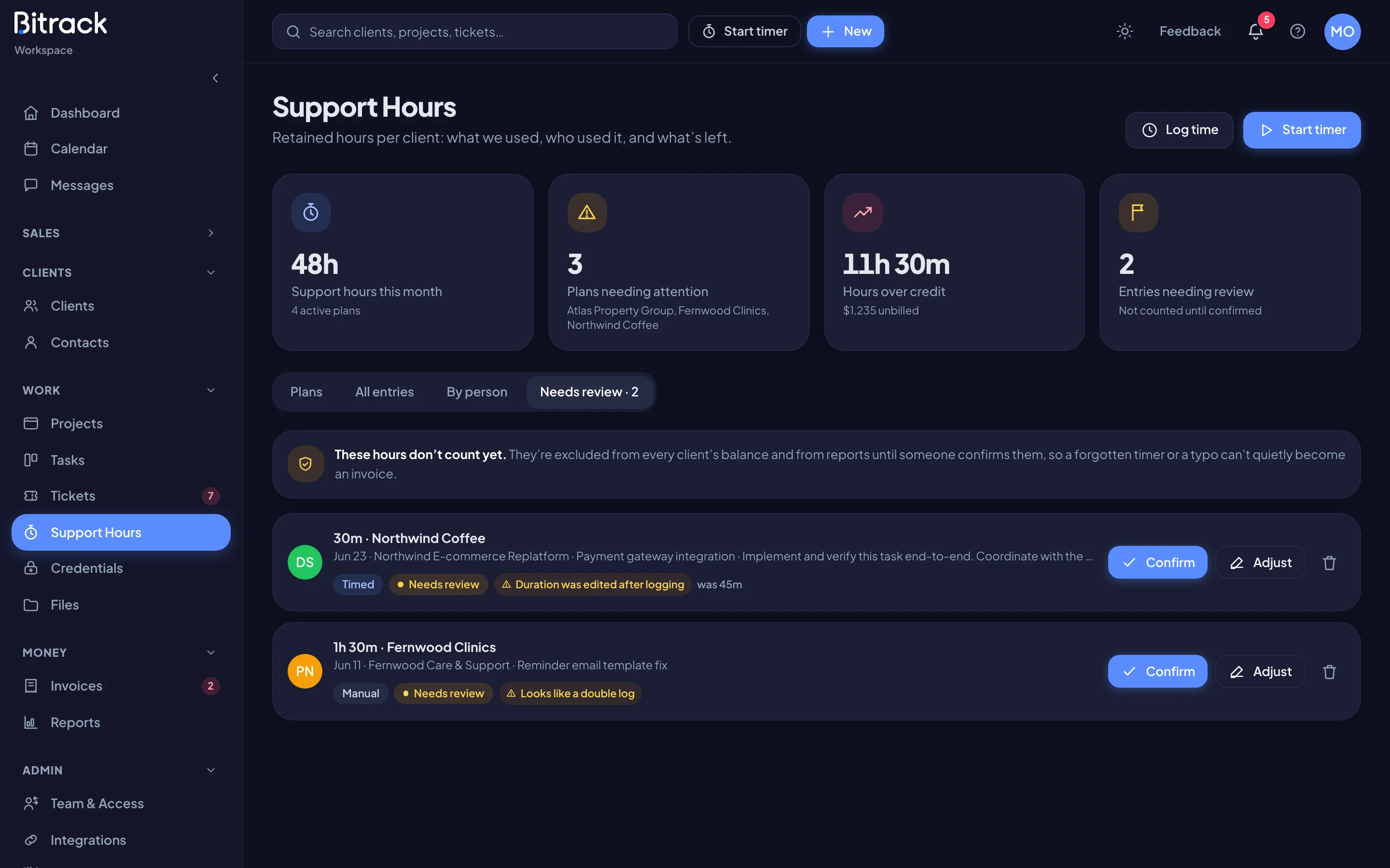 The Needs review tab with flagged entries and their reasons (dark mode)